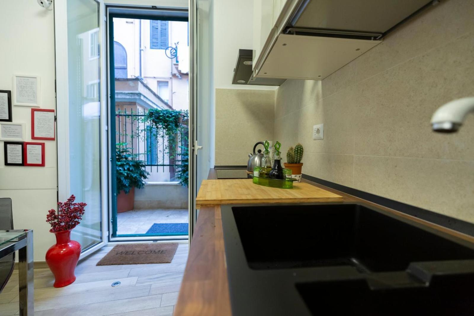 Flatinrome Trastevere Deluxe Rooms - Green Patio Exterior foto